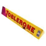 شکلات شیری با طعم عسل کشمش و نوقای بادام تابلرون 100 گرم Toblerone Fruit & Nut Chocolate Swiss Milk